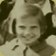 Photo of a young girl smiling(circa 1930). The photo was used in the video Nation to Nation.
